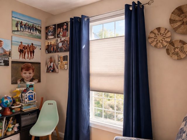 Custom roller shades in a home where the owner checked local utility rebate programs