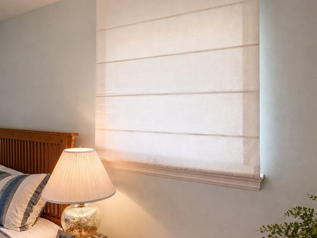 Closed honeycomb cellular shades insulating a window against Iowa weather
