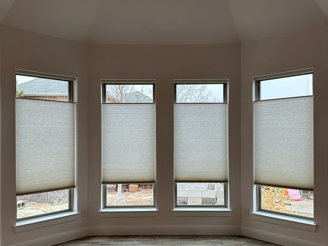 Double cell cellular shades keeping a bedroom warm on a cold Iowa night