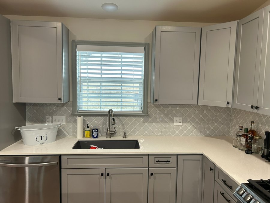Matching blinds across mismatched window heights in a split level home