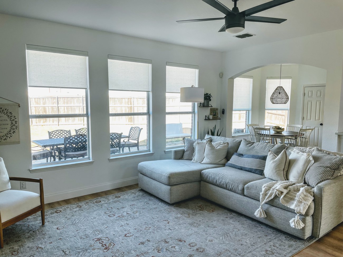 Custom roller shades installed for year round energy comfort in an Iowa home