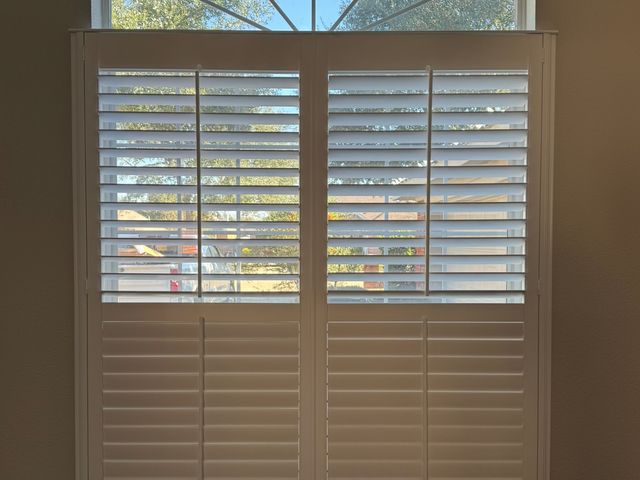 Custom shutters facing a walkable street in an Ankeny planned community