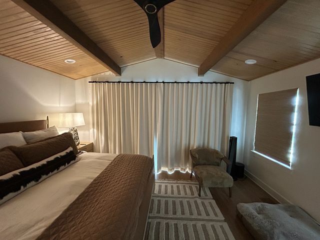 Smart shades controlled by remote in an East Village Des Moines loft