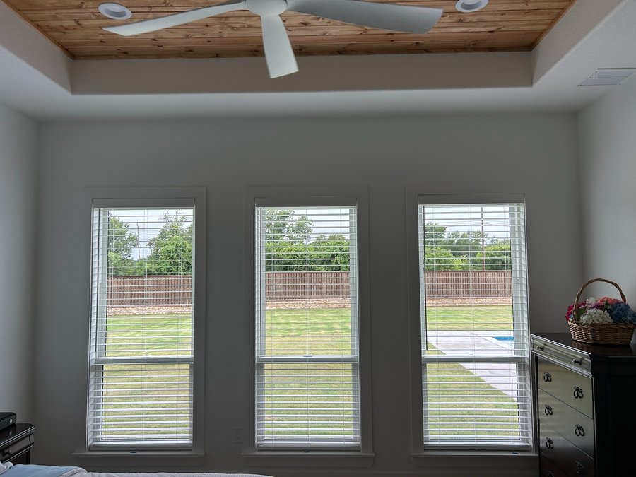 White faced custom blinds satisfying a typical HOA street facing guideline