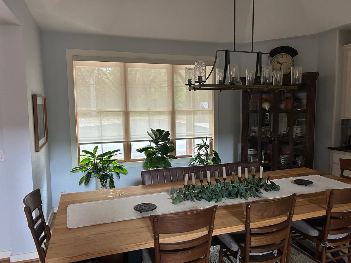 Woven wood shades in a newer Ankeny area home dining room