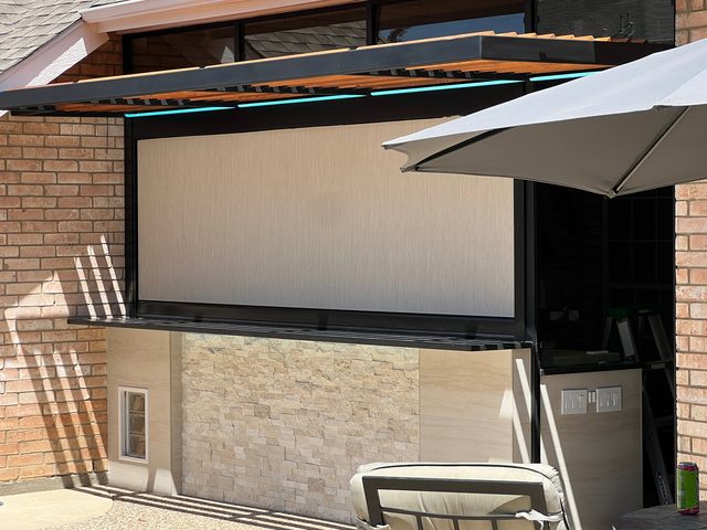 Custom patio shades installation by Love Is Blinds Iowa