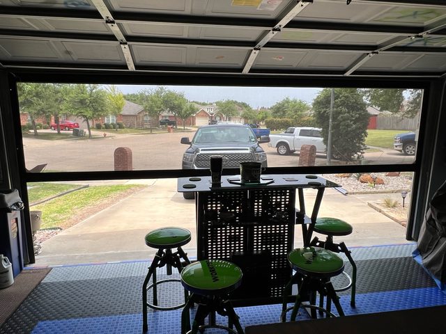 Custom patio shades installation by Love Is Blinds Iowa