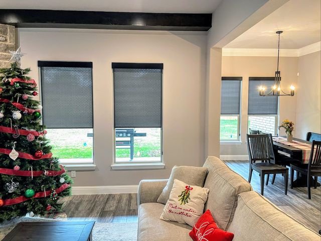 Custom Roller Shades installation by Love Is Blinds Iowa