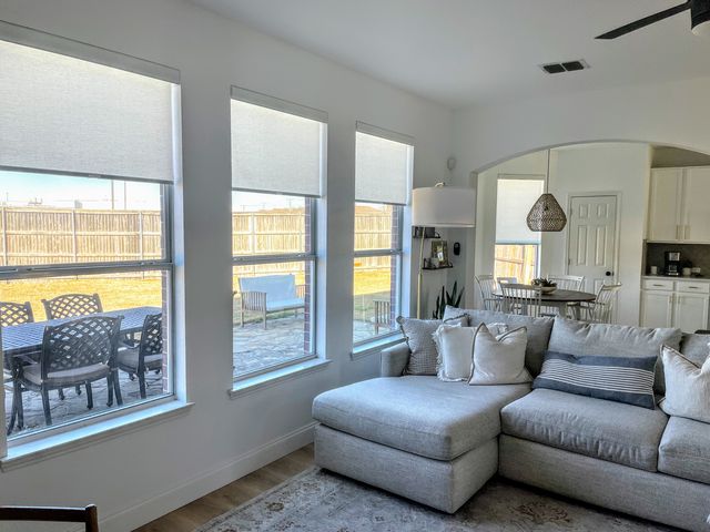 Custom Roller Shades installation by Love Is Blinds Iowa