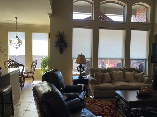 Custom Roller Shades installation by Love Is Blinds Iowa
