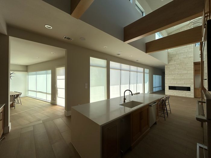 Custom Roller Shades installation by Love Is Blinds Iowa