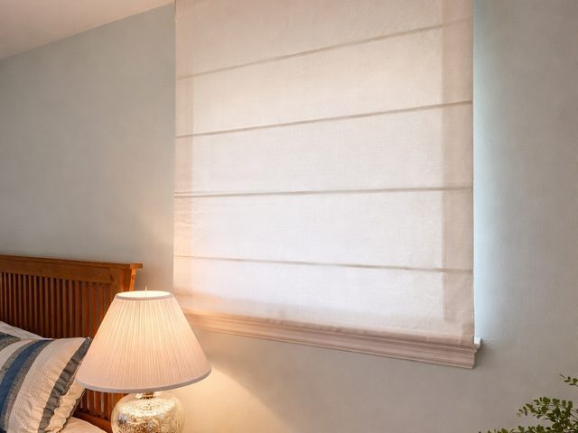 Custom Roman Shades installation by Love Is Blinds Iowa