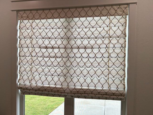 Custom Roman Shades installation by Love Is Blinds Iowa