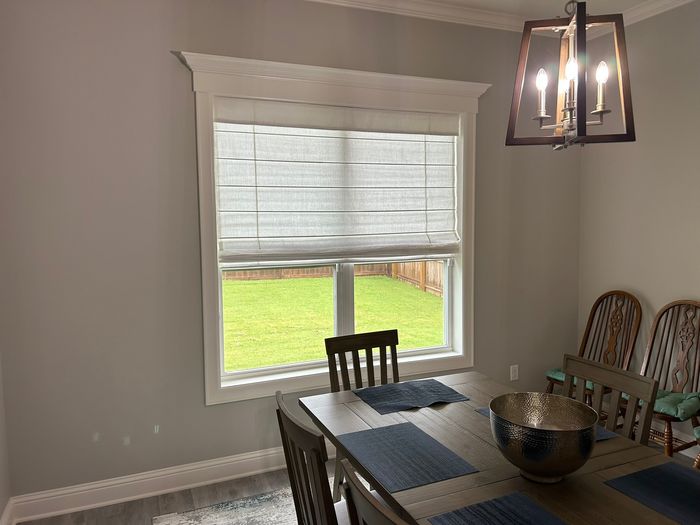 Custom Roman Shades installation by Love Is Blinds Iowa
