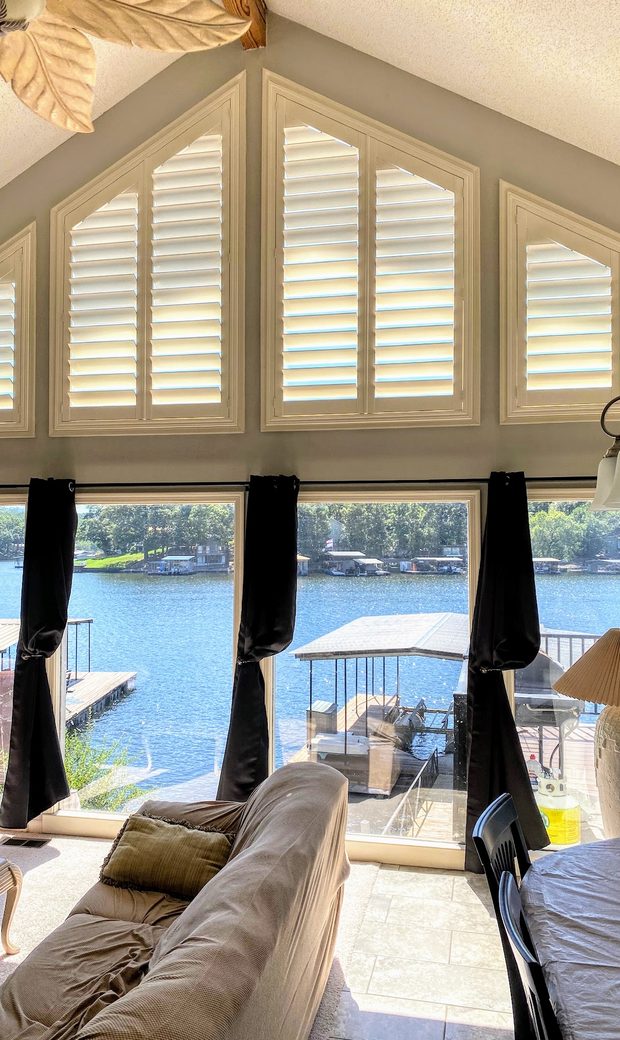Plantation shutters in an Iowa great room by Love Is Blinds