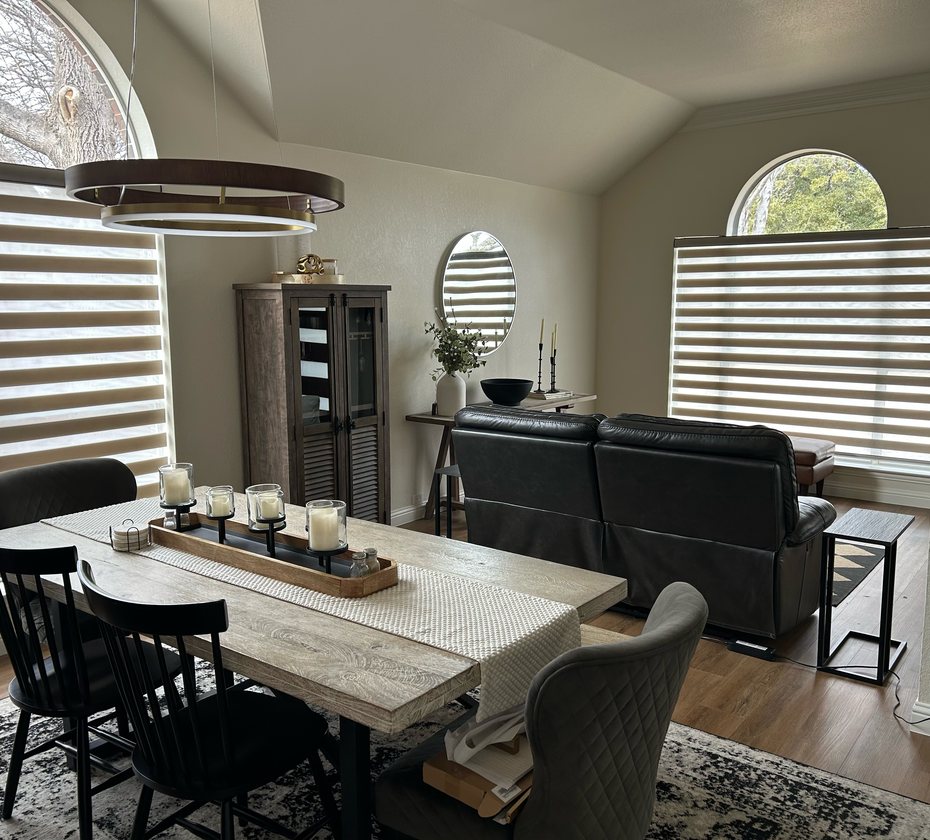 Dining and living room with custom banded shades by Love Is Blinds