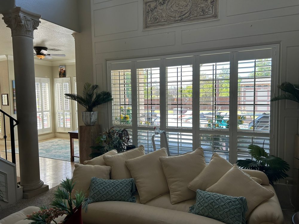 White composite plantation shutters in an Iowa home by Love Is Blinds